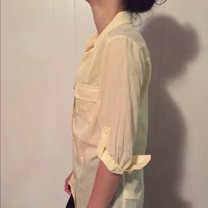 Yellow button up blouse